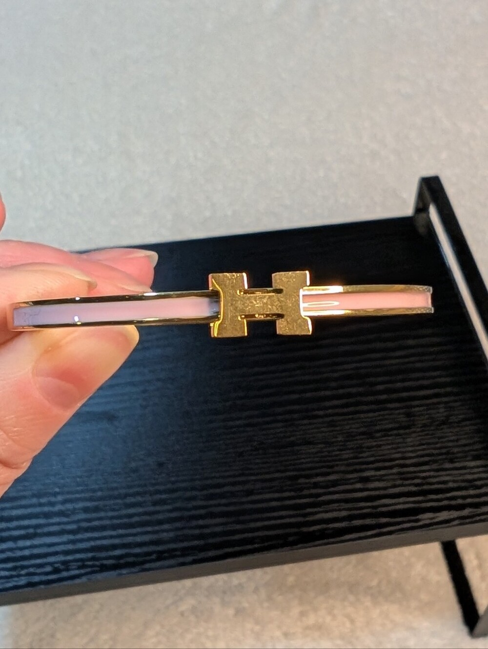 Gold-Tone H Bracelet with Pink Enamel Accent